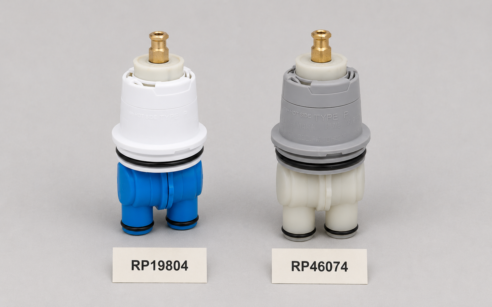 Delta cartridge identification by cap color: RP19804 white-blue cap (left) versus RP46074 gray cap (right)