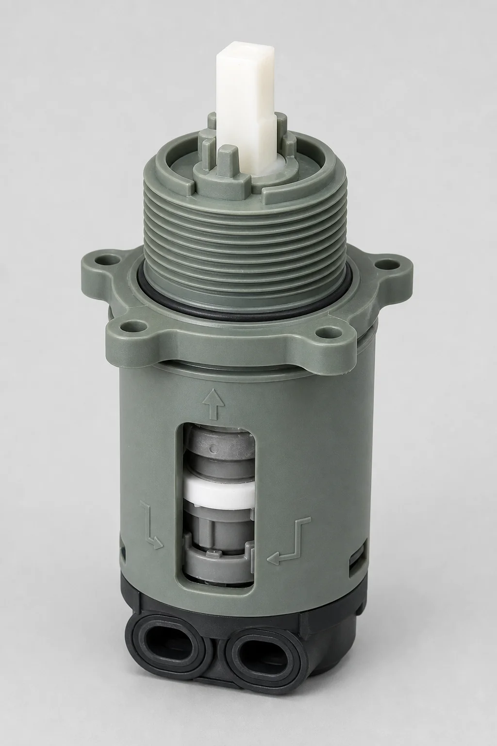 Close-up of a Pfister 974042 cartridge showing its outside threading, white stem, and integrated temperature-limit stop