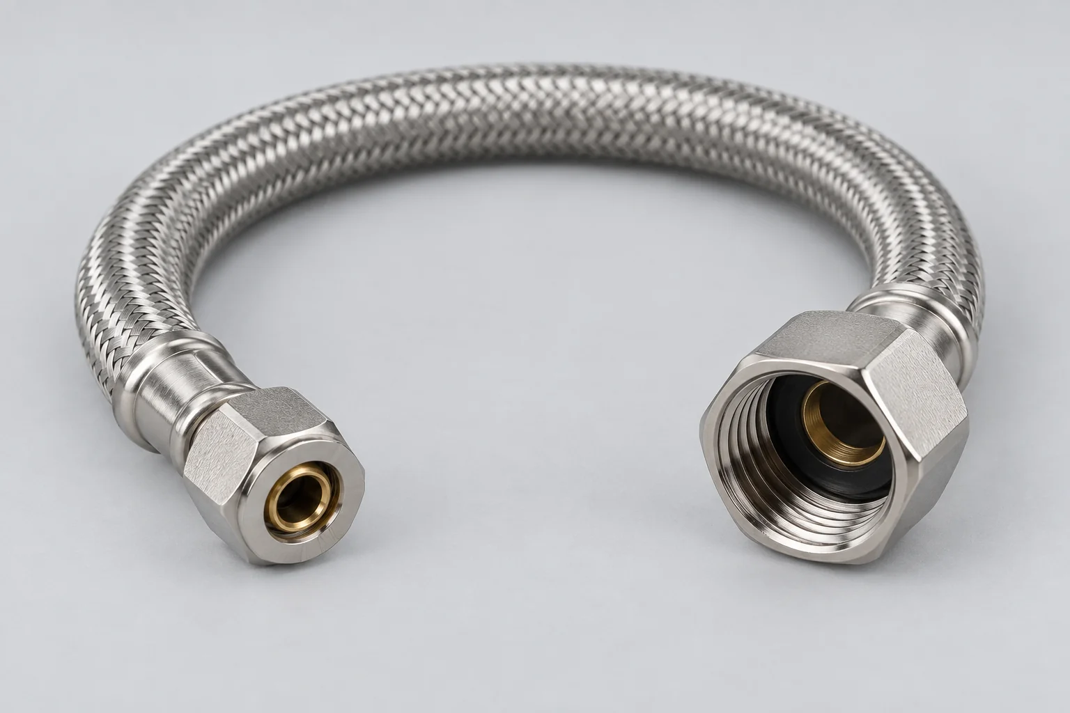 Braided faucet supply line with a 3/8-inch compression end and a 1/2-inch FIP end